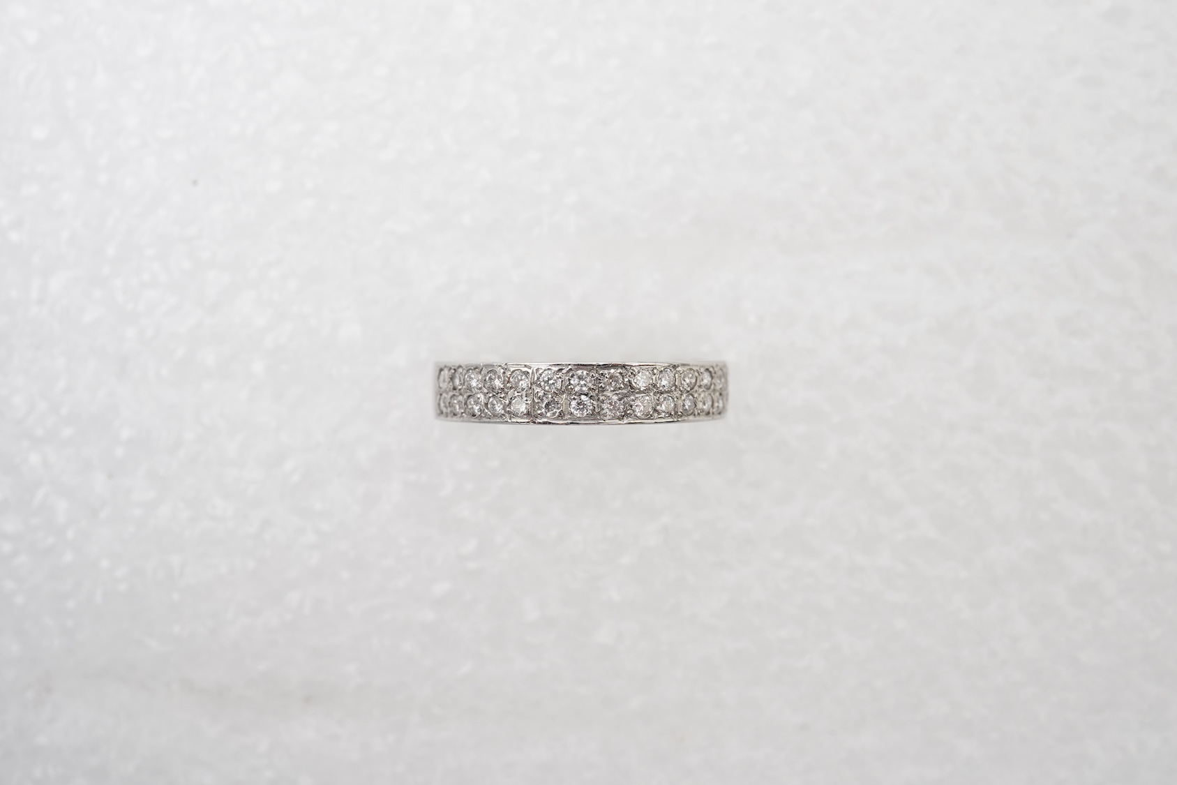 A diamond half eternity ring